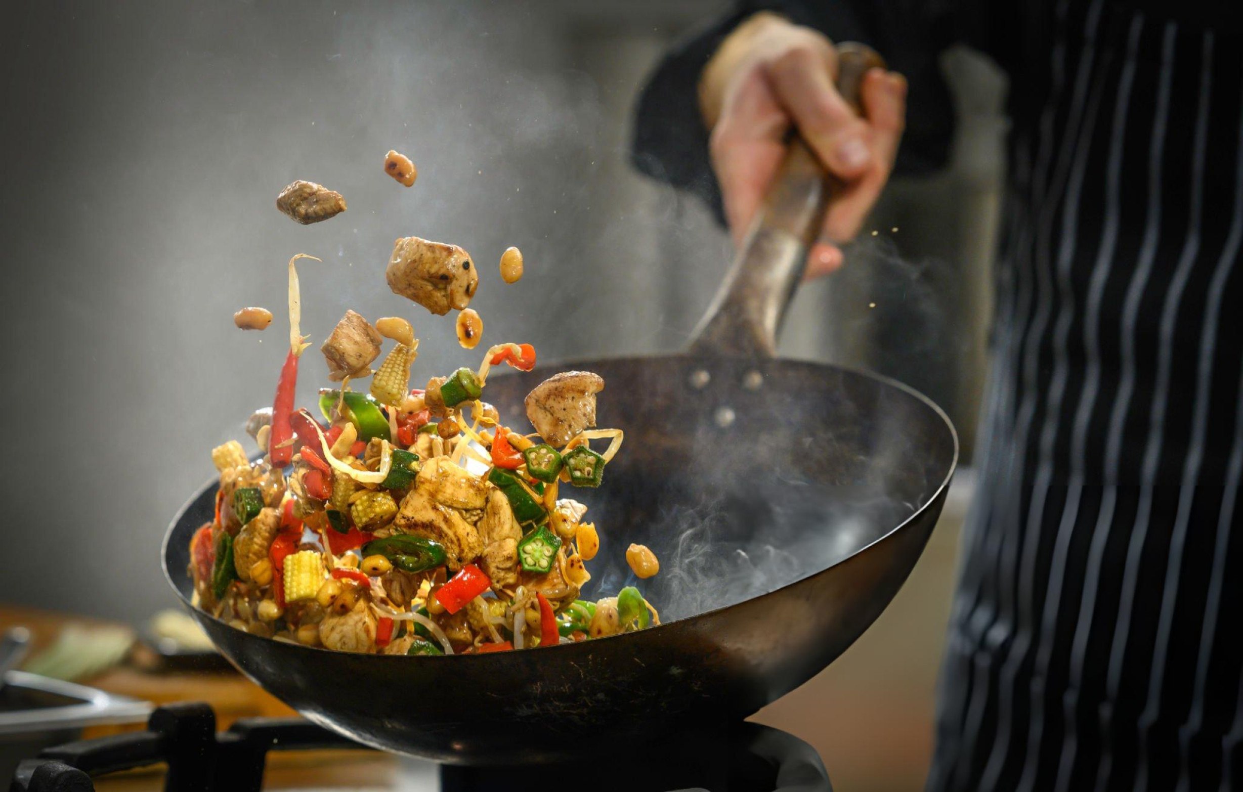 Chef Cooking Food in Kitchen